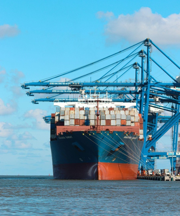 Shipping containers at port representing global sourcing logistics