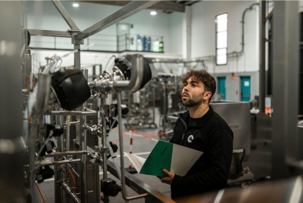 ngineer conducting quality inspection in a manufacturing facility